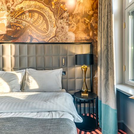 Grand Poet Hotel And Spa By Semarah Рига Екстериор снимка A room at the hotel