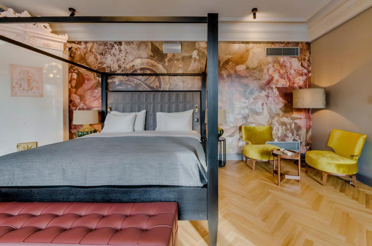 Grand Poet Hotel And Spa By Semarah Рига Екстериор снимка A suite at the hotel