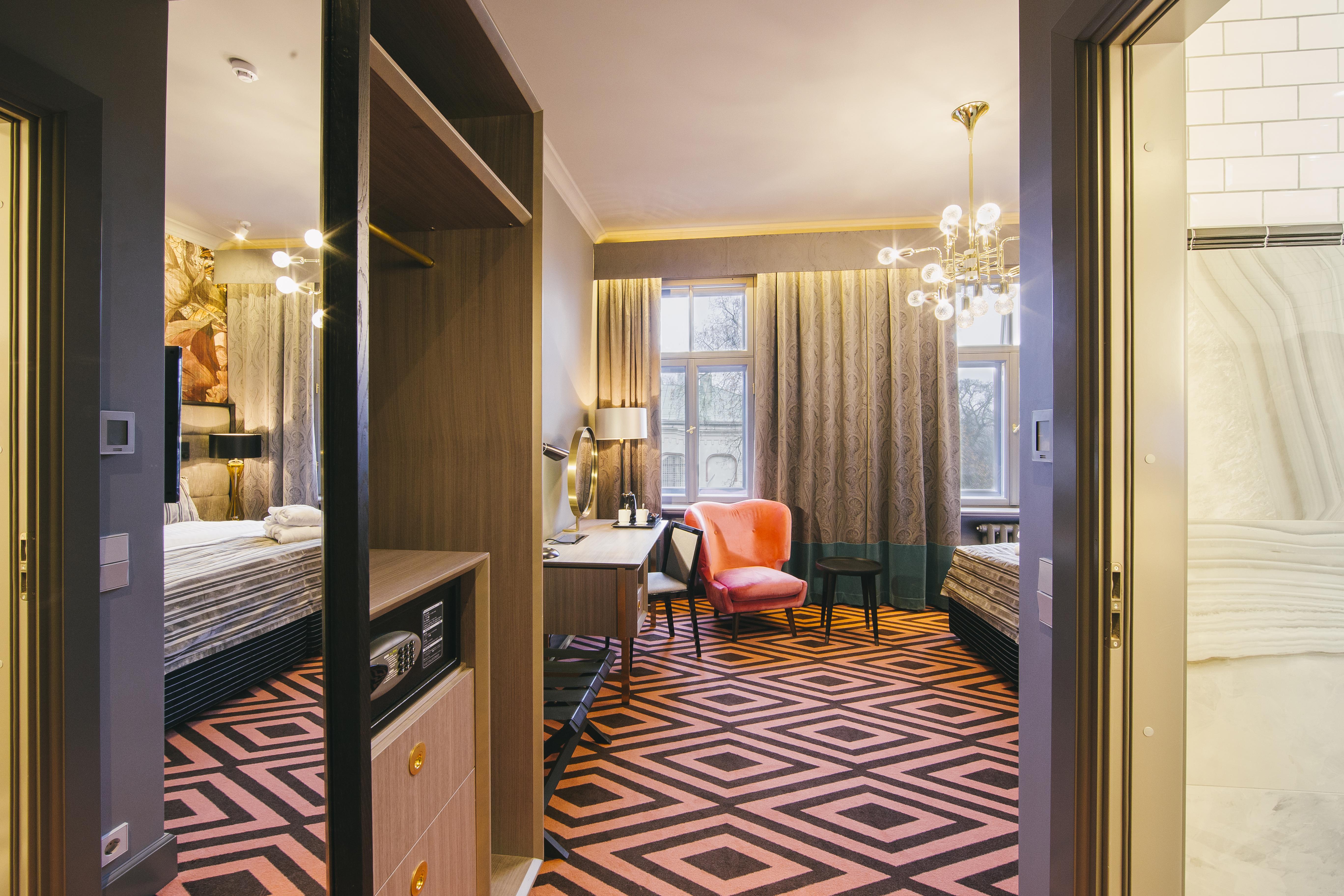 Grand Poet Hotel And Spa By Semarah Рига Екстериор снимка A suite at the hotel