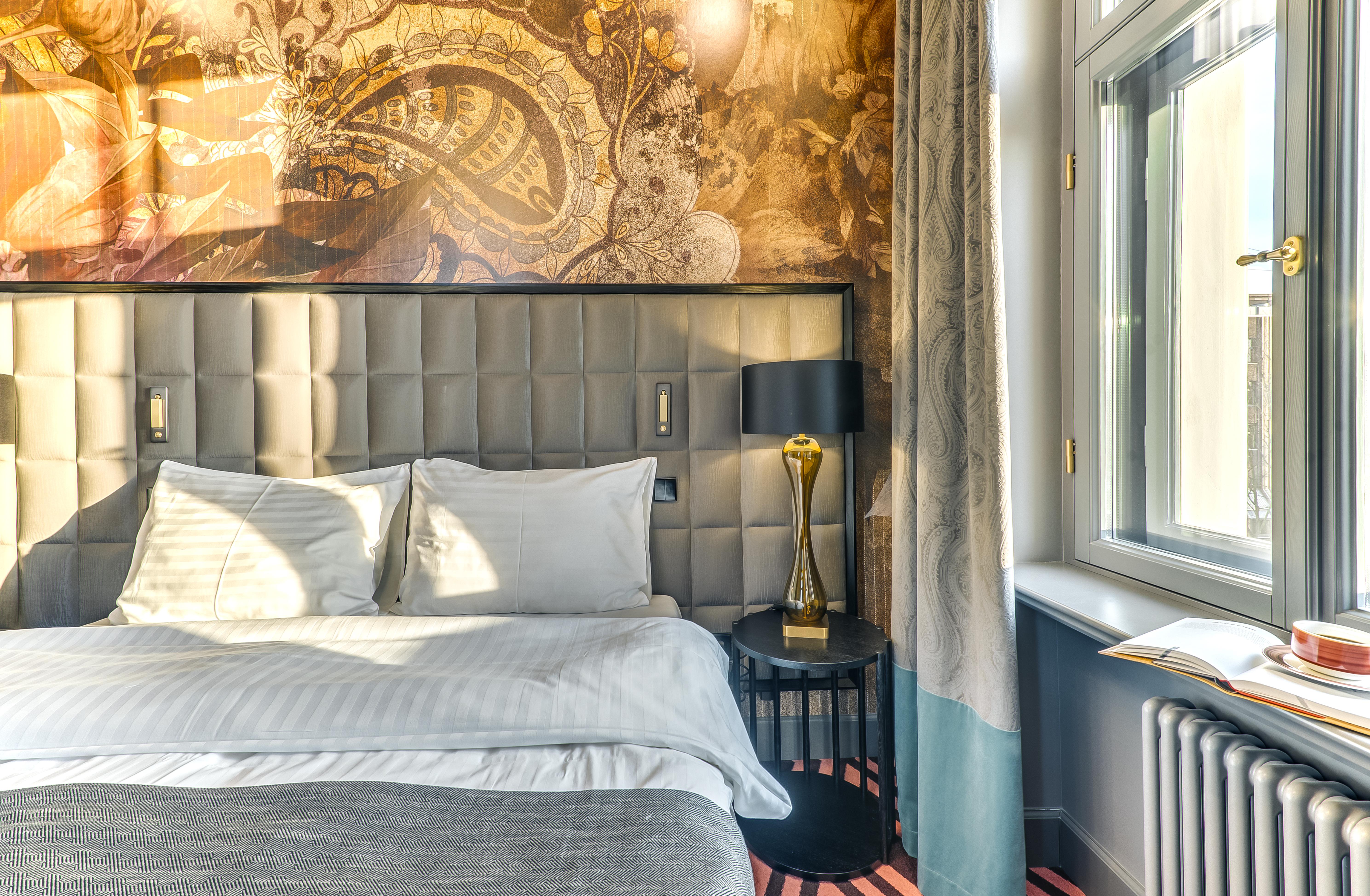 Grand Poet Hotel And Spa By Semarah Рига Екстериор снимка A room at the hotel