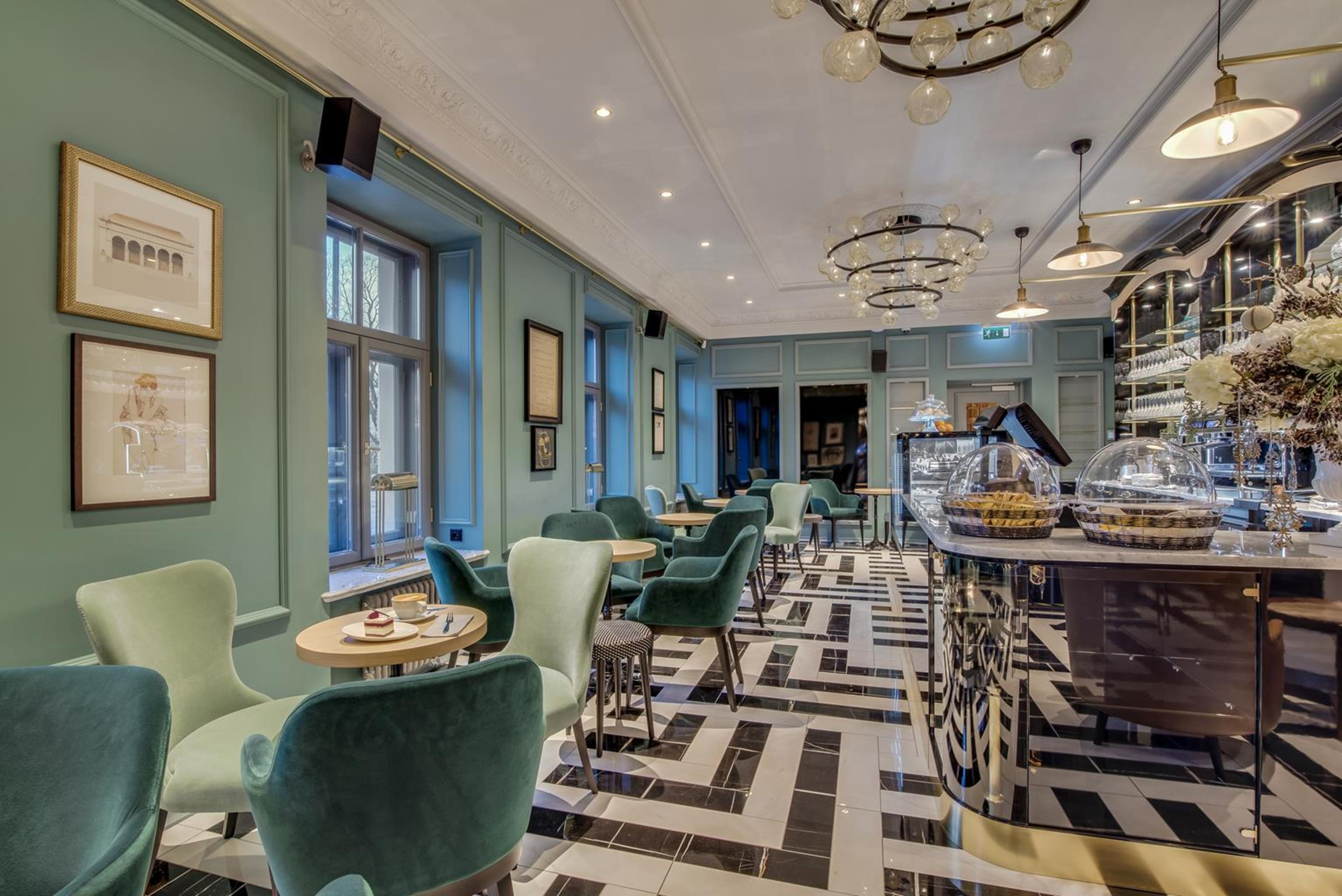 Grand Poet Hotel And Spa By Semarah Рига Екстериор снимка The interior of the restaurant