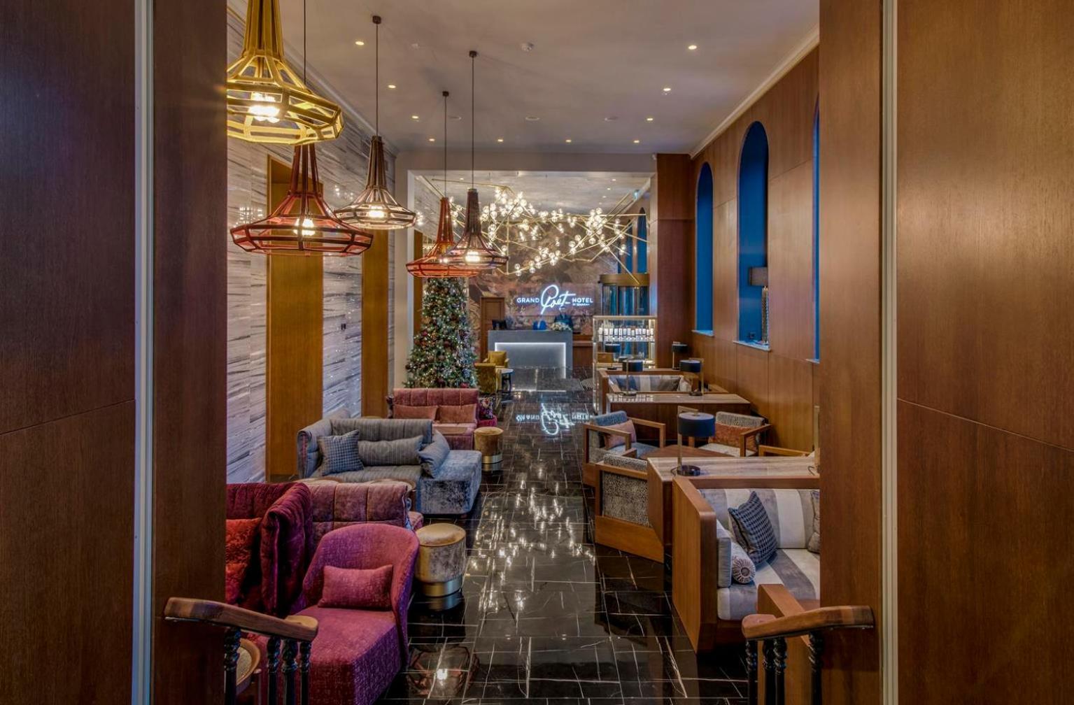 Grand Poet Hotel And Spa By Semarah Рига Екстериор снимка The Lounge at the hotel