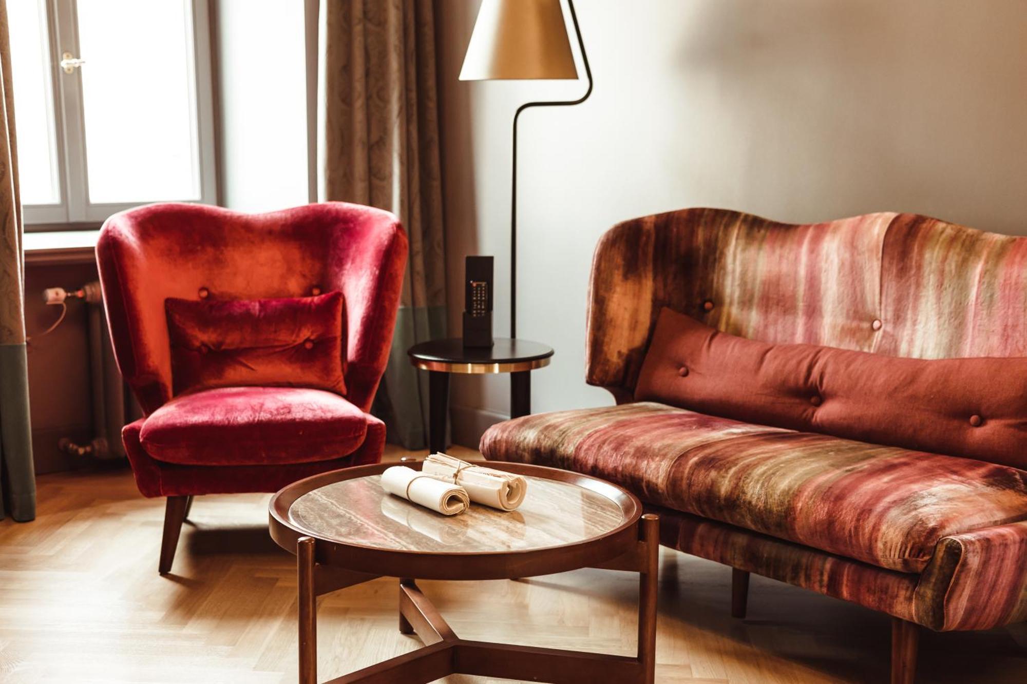 Grand Poet Hotel And Spa By Semarah Рига Екстериор снимка A sofa and armchair upholstered in velvet