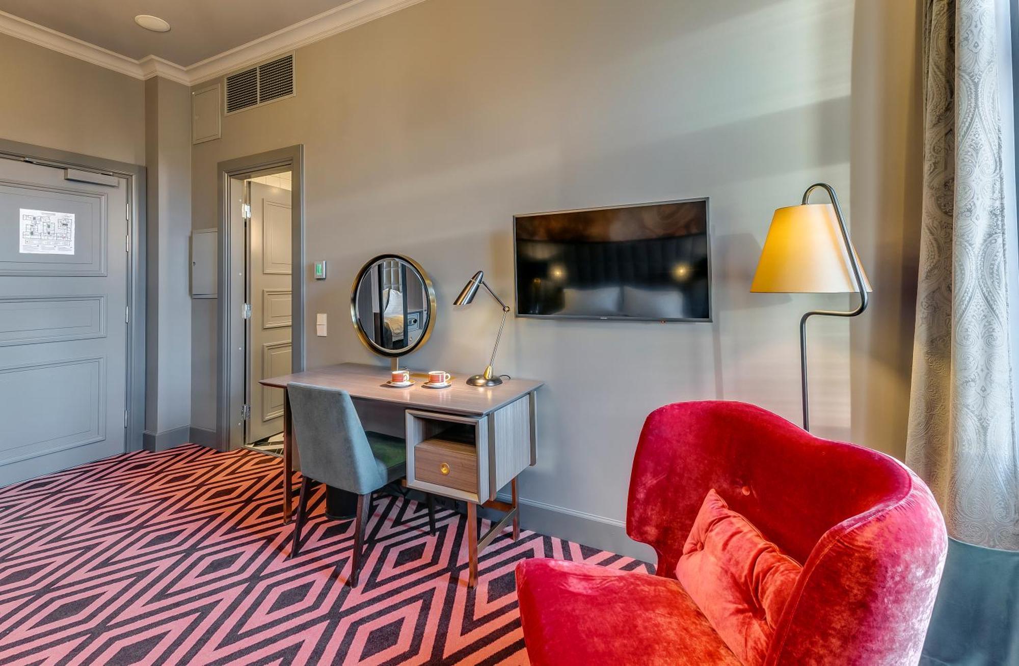 Grand Poet Hotel And Spa By Semarah Рига Стая снимка A room at the hotel