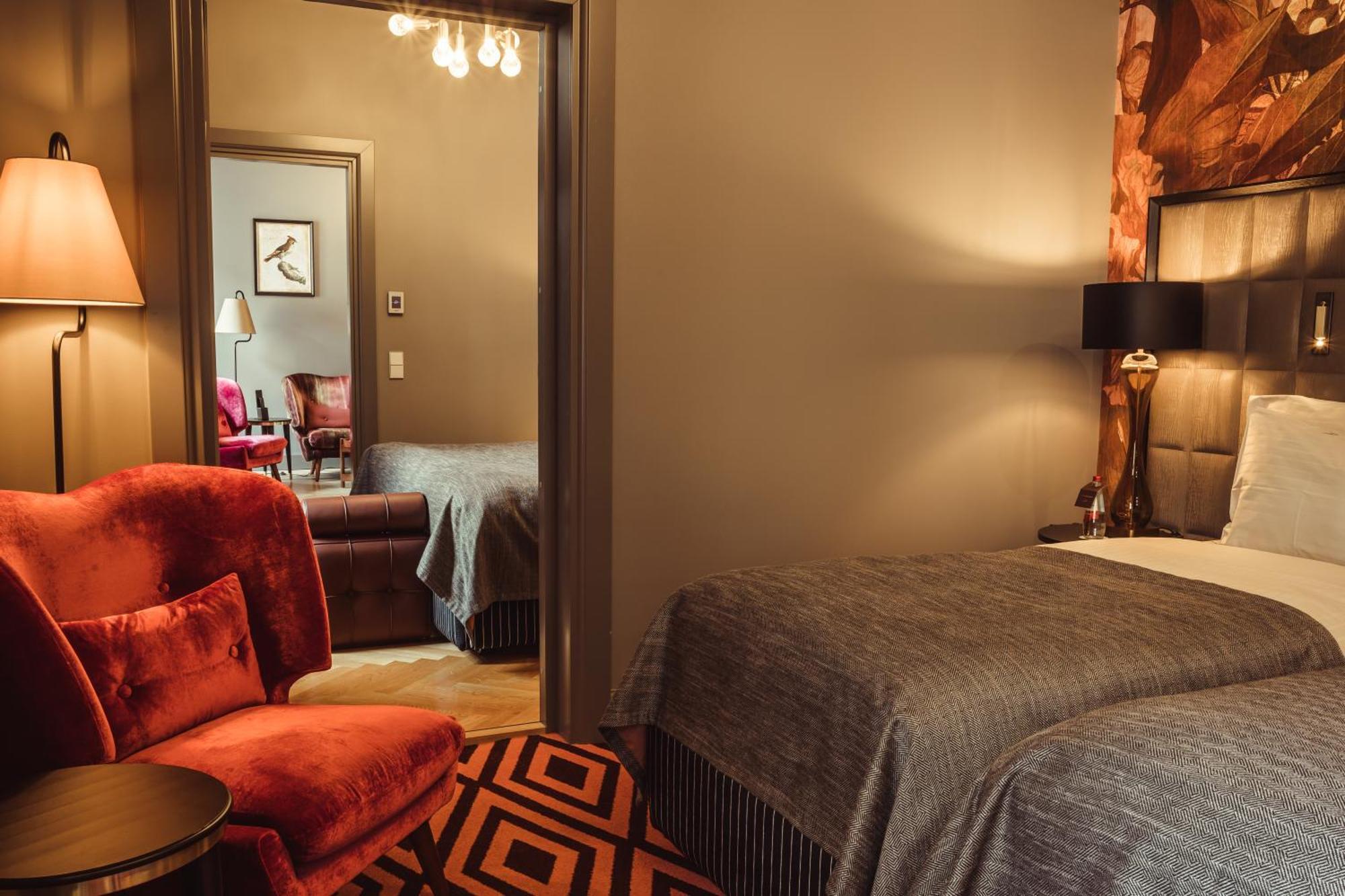 Grand Poet Hotel And Spa By Semarah Рига Екстериор снимка A room at the hotel